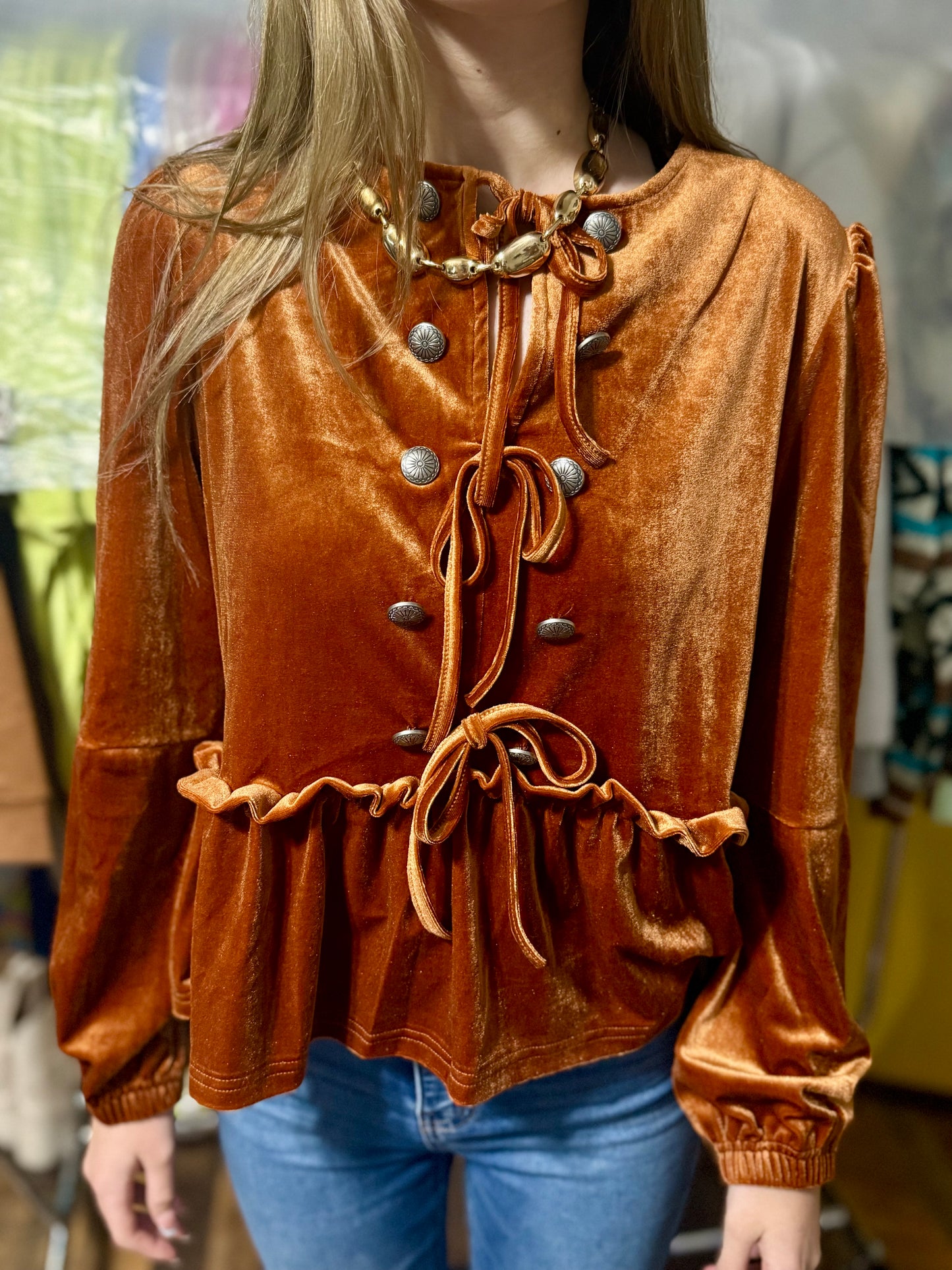 Rust velvet long sleeve peplum top, bow ties & conchos